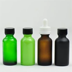 گلاس ضروری تیل کی بوتل